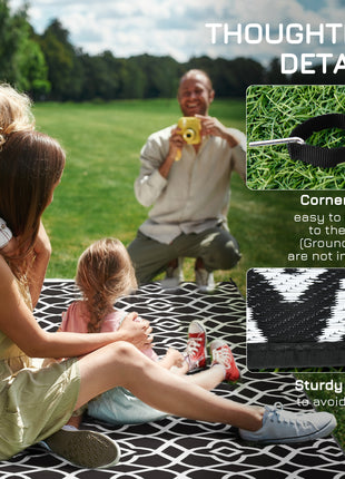 Reversible Outdoor Rug Carpet RV Camping Rugs with Carry Bag, 9' x 18', Black & White Clover