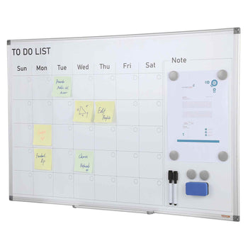 Clear glass weekly planner board with white frame, colorful post-it notes, and markers for organizing tasks.