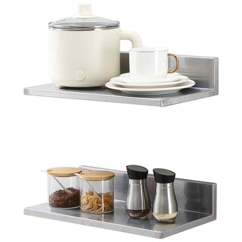 Stainless steel wall-mounted shelf with white ceramic kettle, gold-accented cup, and glass storage containers.