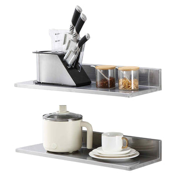 Modern stainless steel kitchen shelf with knife holder, glass canisters, rice cooker, and elegant white dishware.
