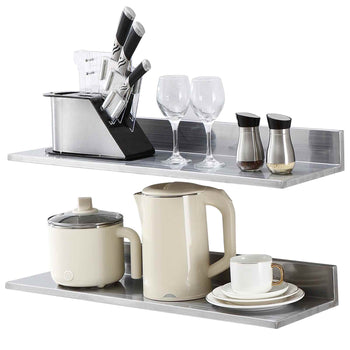 Stylish stainless steel kitchen shelf with white kettle, glassware, and cookware, perfect for modern home organization.