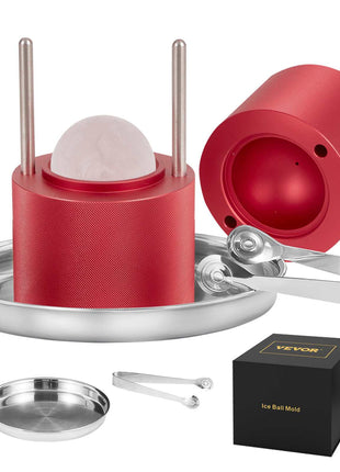 Red aluminum ice ball mold set with stainless steel tongs, tray, and round ice maker for perfect spheres.