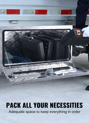 Silver aluminum underbody truck tool box with reflective mirror finish, ideal for organizing tools and accessories.