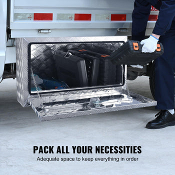 Silver aluminum underbody truck tool box with reflective mirror finish, ideal for organizing tools and accessories.