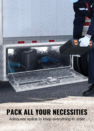 Aluminum underbody tool box with diamond plate finish, silver, ideal for trucks, providing ample storage space.