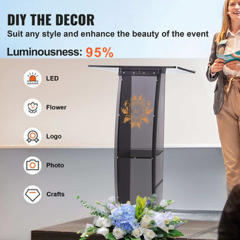 Black acrylic podium with LED lighting, elegant design, ideal for events, featuring floral arrangements and customizable options.