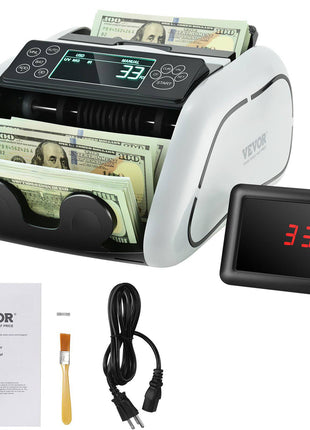 White and black VEVOR banknote counter with digital display, USB cable, user manual, and cleaning brush included.