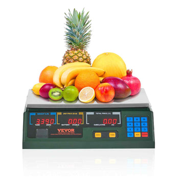 Digital scale with colorful fruits including pineapple, bananas, oranges, kiwi, and apples, featuring a green base.