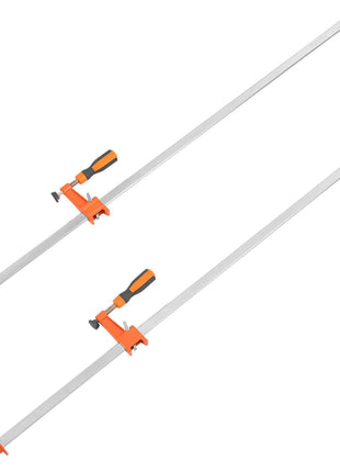 Orange and black aluminum bar clamps, featuring a durable grip, ideal for woodworking and DIY projects.