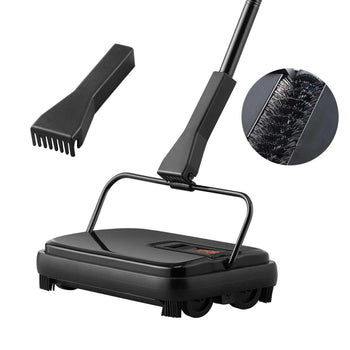 Black handheld carpet sweeper with detachable brush and comb, designed for easy cleaning on various surfaces.