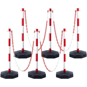 Red and white striped retractable barrier poles with black bases and linked chains, ideal for crowd control and event management.