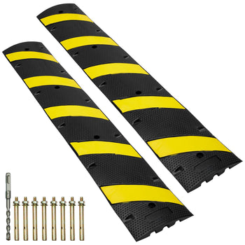 Black and yellow rubber speed bumps with reflective stripes, ideal for traffic calming in driveways or parking lots.