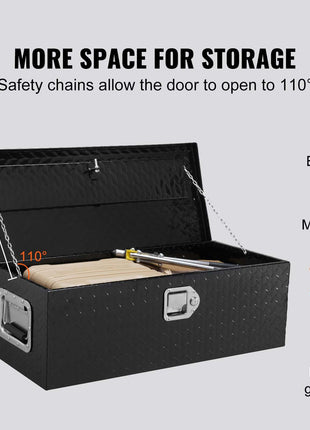 Black metal storage box with diamond plate finish, features 110° opening and safety chains, ideal for tools and equipment.