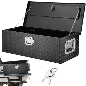 Black diamond plate aluminum truck tool box with lock and keys, designed for durability and secure storage.