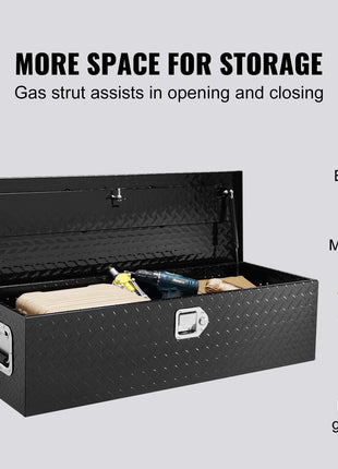 Black diamond-plate storage chest with gas strut lid, ideal for tools and equipment, measures 13 inches high.