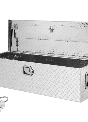 Silver diamond plate aluminum truck tool box with double locking mechanism and keys, perfect for secure storage.