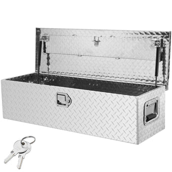 Silver diamond plate aluminum truck tool box with double locking mechanism and keys, perfect for secure storage.