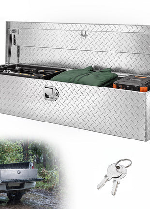 Silver diamond plate truck toolbox with secure lock, perfect for tools and outdoor gear storage, durable and stylish.