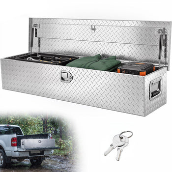 Silver diamond plate truck toolbox with secure lock, perfect for tools and outdoor gear storage, durable and stylish.