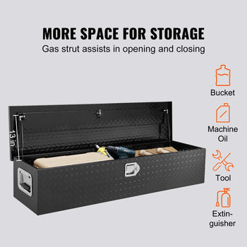 Black diamond plate tool storage box with gas strut, featuring a 13-inch height and spacious interior for tools and supplies.