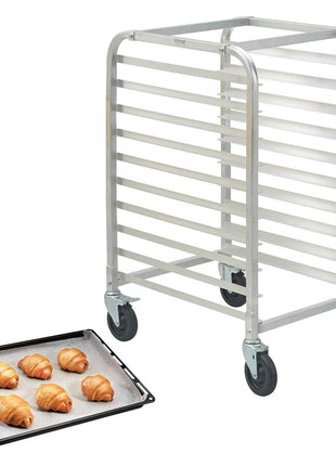 Aluminum bakery rack with six shelves and wheeled base, paired with a black baking sheet and croissants.