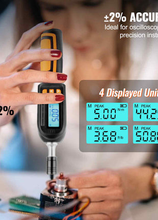 Digital torque wrench in black and yellow with LCD display, ideal for oscilloscopes, precise measurements.
