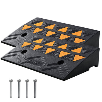 Black rubber wheel chocks with orange traction pads; ideal for stabilizing vehicles. Set includes screws for secure placement.