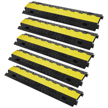 Heavy-duty rubber speed bumps, black with yellow reflective stripes, ideal for traffic management and safety control.