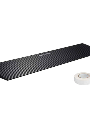 Black rubber threshold ramp with ridges and included clear adhesive tape for secure installation. Ideal for smooth transitions.