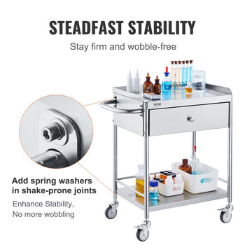 Silver stainless steel medical cart with a drawer and stable wheels, featuring spring washers for enhanced stability.