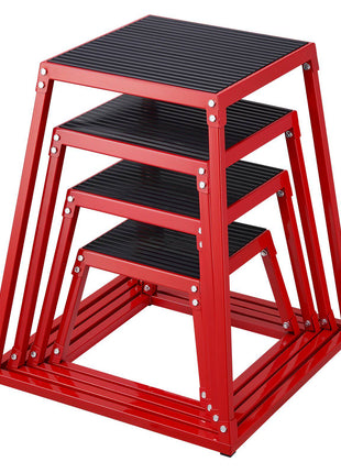 Red metal stacking stools with black striped seats, perfect for modern indoor or outdoor decor, space-saving design.