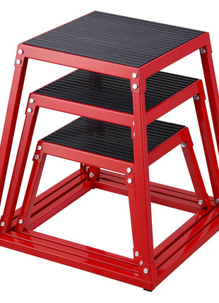 Stackable red metal storage shelves with black ribbed tops, perfect for organizing and adding a pop of color to any space.