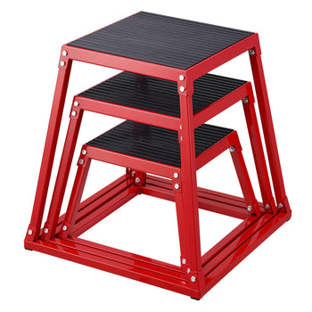 Stackable red metal storage shelves with black ribbed tops, perfect for organizing and adding a pop of color to any space.