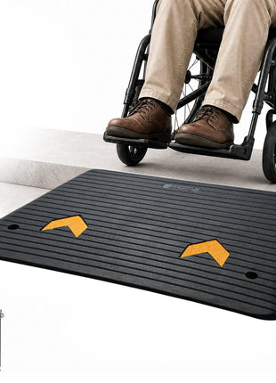 Black wheelchair ramp mat with textured surface, featuring yellow traction stripes for enhanced safety and accessibility.