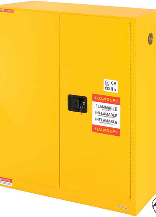 Yellow flammable storage cabinet with lock, featuring OSHA caution labels and sturdy metal construction for safety.
