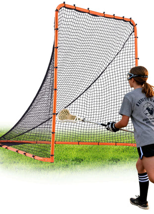 Lacrosse rebounder net with orange frame and black netting, ideal for drills, on green grass background.
