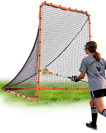 Lacrosse rebounder net with orange frame and black netting, ideal for drills, on green grass background.